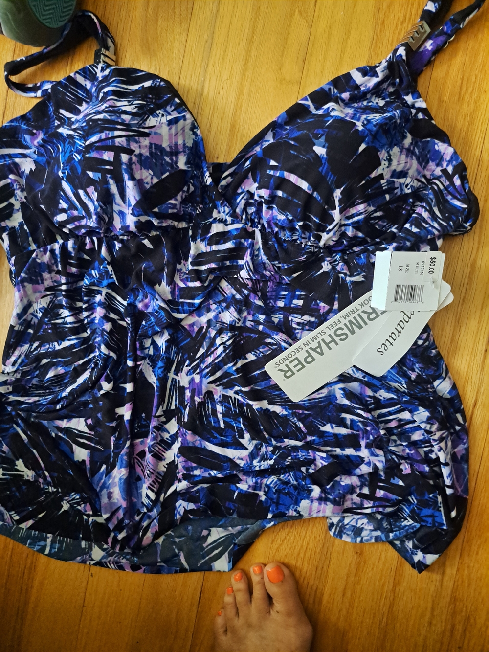 New Trimshaper swimsuit top is a size 18. This top has a blue, black, and purple